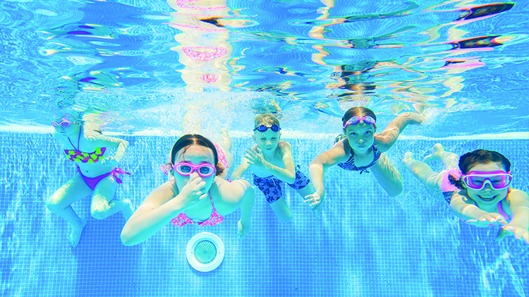 Kids swimming under water